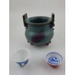 A Chinese Jun ware style glazed incense burner of cauldron form,