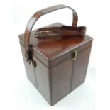 A plated ice bucket and ice tongs, in brown leather travelling case.