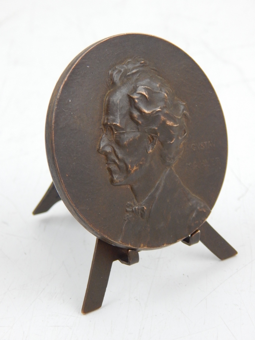 A bronze medal of Gustav Mahler by Alfred Rothberger, 1905,with art nouveau decoration to reverse,