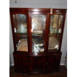 A contemporary rosewood display cabinet,