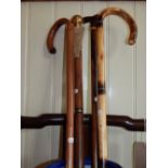 A Victorian style brass mounted sectional walking cane, incorporating a compass and flask,