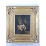 An 18th century style oil, figures in a garden landscape, gilt framed. H. 24cm, W.