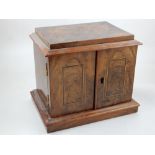 A late Victorian ebony and boxwood banded figured walnut two drawer jewellery casket, W.