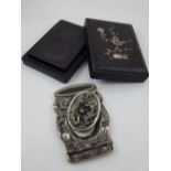 A Chinese inkstone of rectangular form, within a hardwood case inlaid with mother-of-pearl,