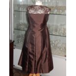 A Salvatore Ferragamo ladies brown silk and wool evening dress, approx. size 14.