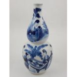 A 19th century Chinese blue and white double gourd vase,