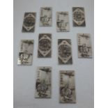 Ten Chinese white metal tokens,