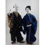 Two 20th century Japanese dolls, the figures dress in traditional garb, H. 45, (2).