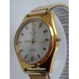 A gilt and stainless steel Tissot gentleman's automatic wristwatch,