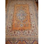 A honey ground Tabriz rug,