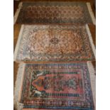 A North West Persian silk prayer rug, on a pale pink ground,