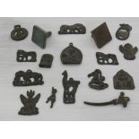 A collection of bronze items, to include mounts,