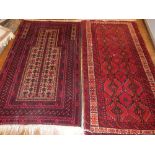 A red ground Balush rug,