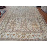 A cream ground Turkish Agra carpet, decorated with stylised foliage, fringed. L.320cm, W.