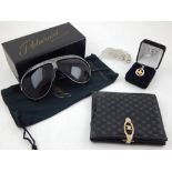A pair of vintage Polaroid sunglasses, with presentation box and soft bag,