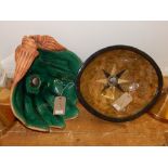 A Portuguese green glazed earthenware counter top basin modelled as a clam shell. W. 46cm together
