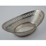 A 20th century oval French silver bonbon dish with pierced body,