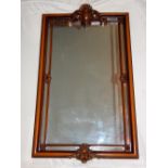 A rectangular wall mirror, the frame with shell surmount and margin plates, H.92cm.