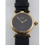 A gold plated Must de Cartier Vendome ladies wristwatch, black dial, no. 152315 18, fitted black