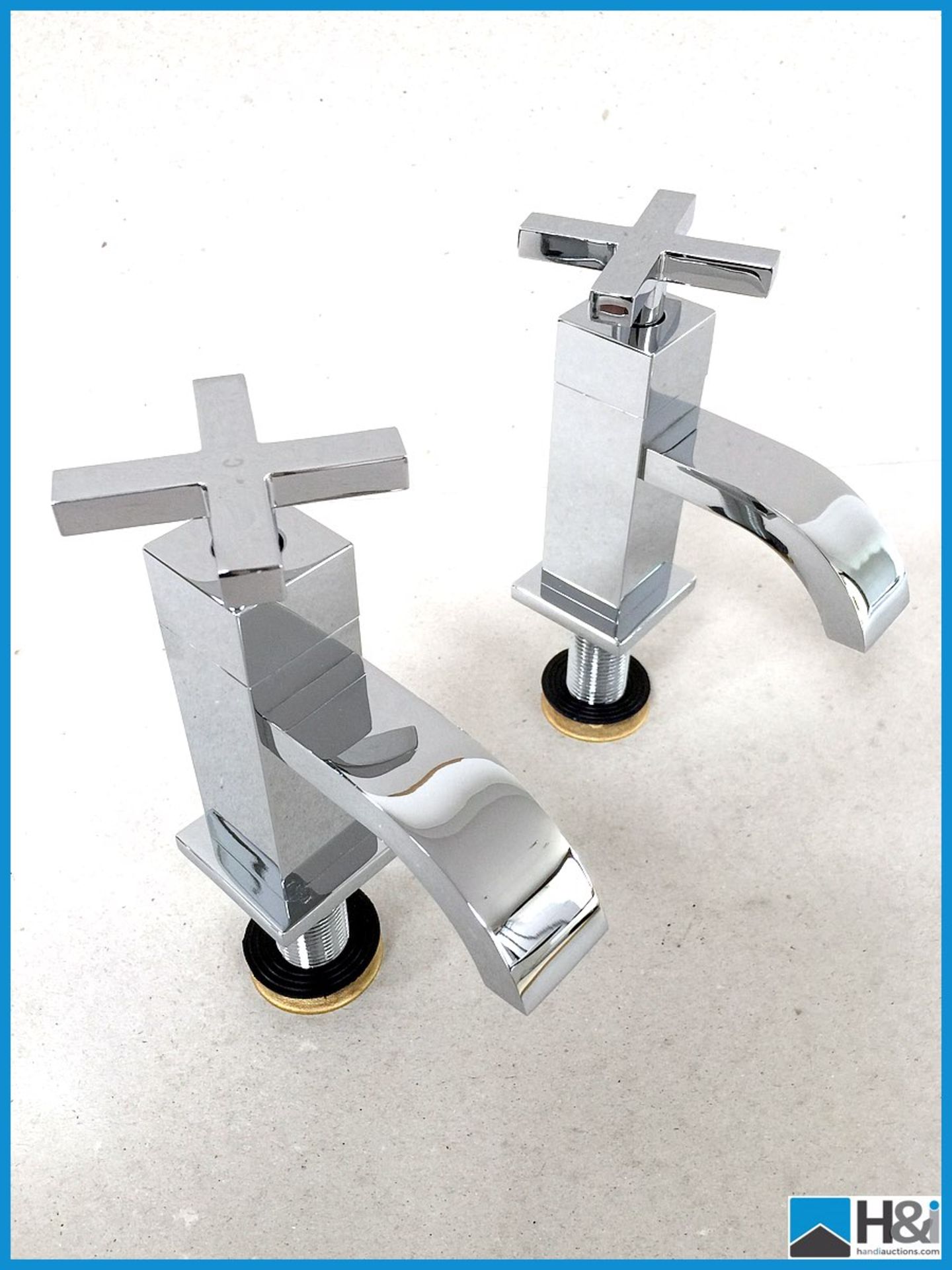 Pair of Beautiful Phoenix basin mixer taps with contemporary cross head design brand new in box