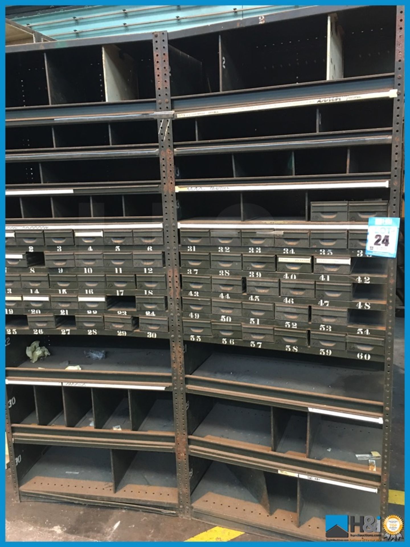 Large double bay metal storage units with drawers and shelves. Very industrial appearance. Approx