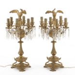 Paire de candélabres d'époque Napoléon III en bronze doré à fût central surmonté d'un perroquet, six