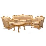 Ensemble comprenant 1 canapé, 2 fauteuils et 1 table basse de style Napoléon III, début XXe s., en