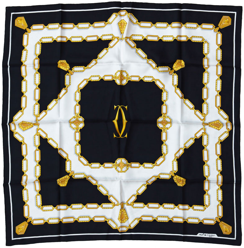 Cartier, carré en soie noir et blanc à décor d'une chaîne en or, boîte, 85x85 cm