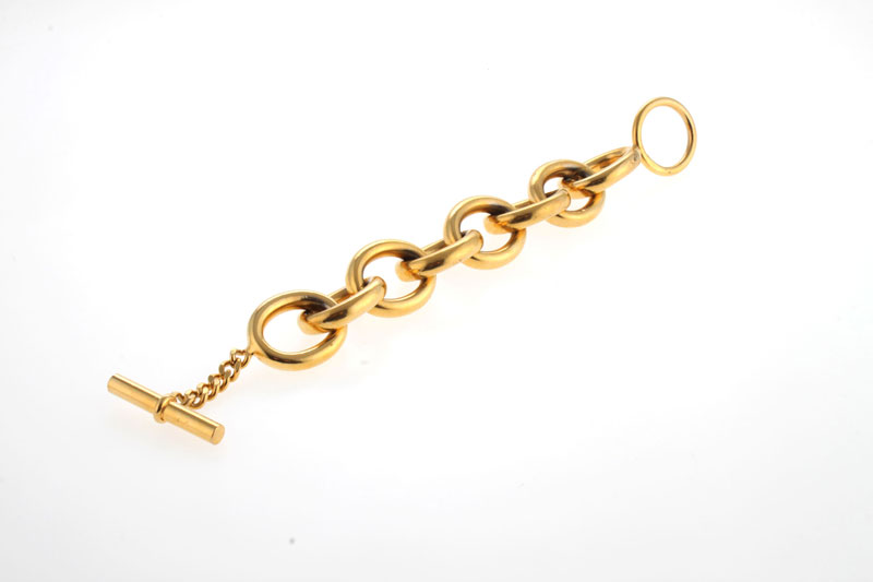 Chanel, bracelet en métal doré à maille gourmette ronde, signé, long. 22 cm