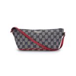 Gucci, petite pochette porté épaule en toile Guccissimi bleu marine et cuir rouge, 11x21 cm