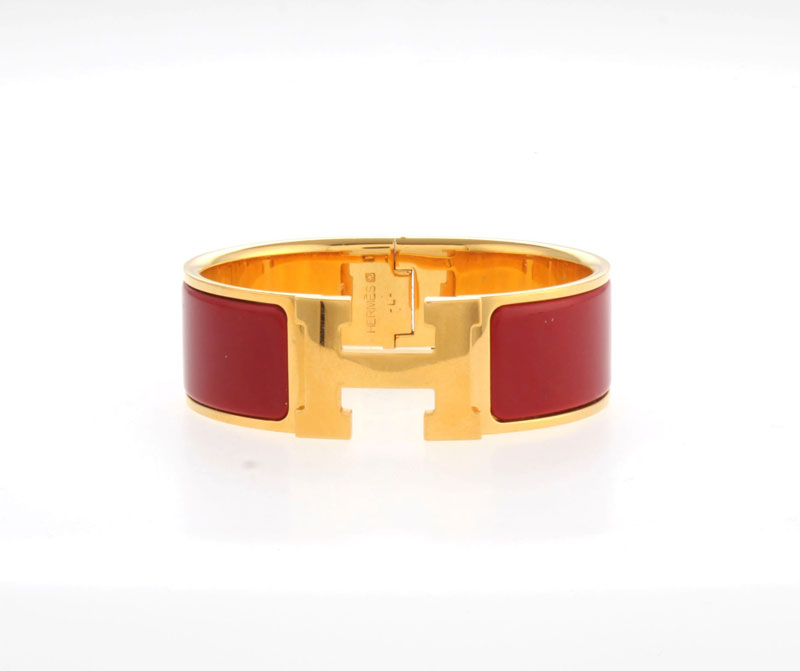 Hermès, Clic H, bracelet en plaqué or et émail rouge, signé, circ. 17 cm