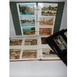 Three albums of coloured and black and white postcards mainly topographical including Bournemouth,