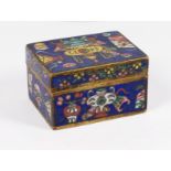 A Cloisonne trinket box of rectangular form, blue ground decorated vases of flowers - 2in. wide