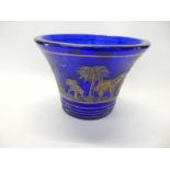A Moser blue vase of oval form with acid etched decoration of elephants and palm trees, signed to