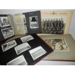 An olive wood album with camels containing black and white military photographs and two Egyptian