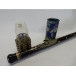A Chinese mother of pearl inlaid opium pipe with horn and ivory ends, a Chinese Cloisonne opium lamp