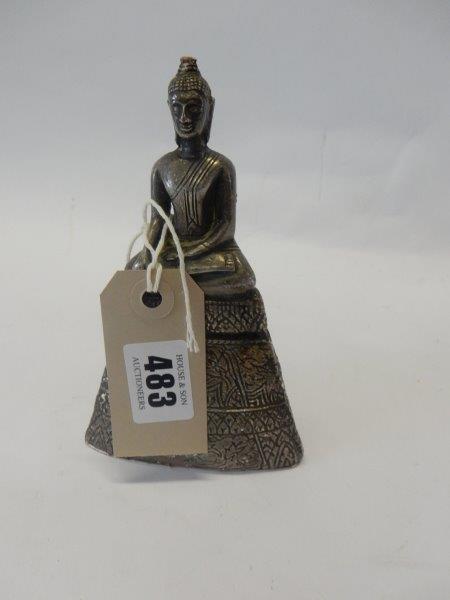 A silver covered model of a seated buddha - 6in. high