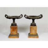 A pair of 19th Century bronze urns on square marble bases - 12in. high