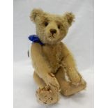 A Steiff teddy bear in golden mohair with articulated limbs