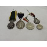 Two commemorative medals, two silver medallions, a collar tag, a Territorial Efficiency medal and