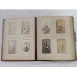 A Victorian brown leather bound photograph album