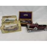 A 19th Century rosewood box containing a set of drawing instruments, two Matchbox models of an