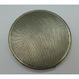 A French silver compact, weight 162g,