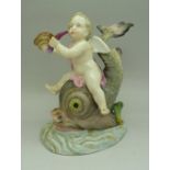 A Dresden model of a boy on a dolphin,