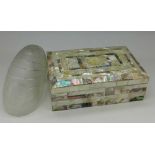 A mother of pearl box and a glass shell