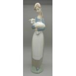 A Lladro figure, 04505, Girl with Lamb, boxed, height 26.