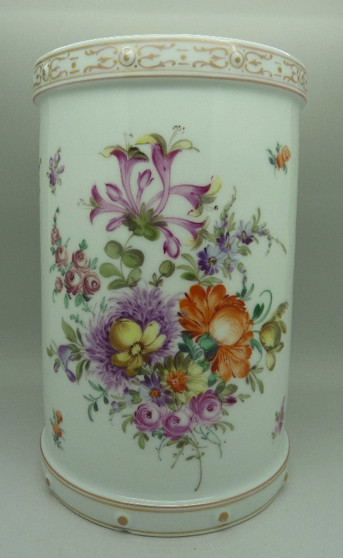 A Dresden cylindrical vase painted with honeysuckle and other summer flowers,