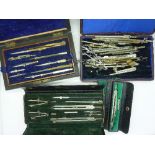 Three drawing sets and drawing implements