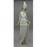 A Lladro figure, 5788, Talk of The Town, boxed,