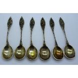 Six continental white metal spoons,